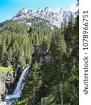 Small photo of waterfall in the Swiss mountains Rosenlaui Valley Switzerland