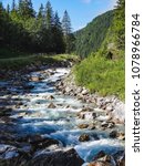 Small photo of river in the Swiss mountains Rosenlaui Valley Switzerland