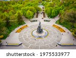 Taras Shevchenko monument at Sumskaya street in Kharkov, Ukraine. Aerial view with green spring trees in park