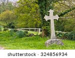 Single Cross Headstone In...
