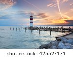 Lighthouse at sunset in Podersdorf am See, lake Neusiedler See, Burgenland, Austria                            