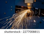 Small photo of The fiber laser cutting machine cutting machine cut the stainless steel tube. The hi-technology sheet metal manufacturing process by laser cutting machine.