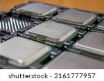 Small photo of Sochi, Russia - May 10 2022: Outdated used Intel Celeron processors in a package. Use of outdated technologies. Technological obsolescence.