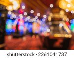 Small photo of casino bokeh light abstract blur background,Blurred image of slots machines at the Casino games on a cruise ship