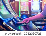 Slot machine play time. female...