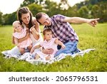 happy family with young ... | Shutterstock . vector #2065796531
